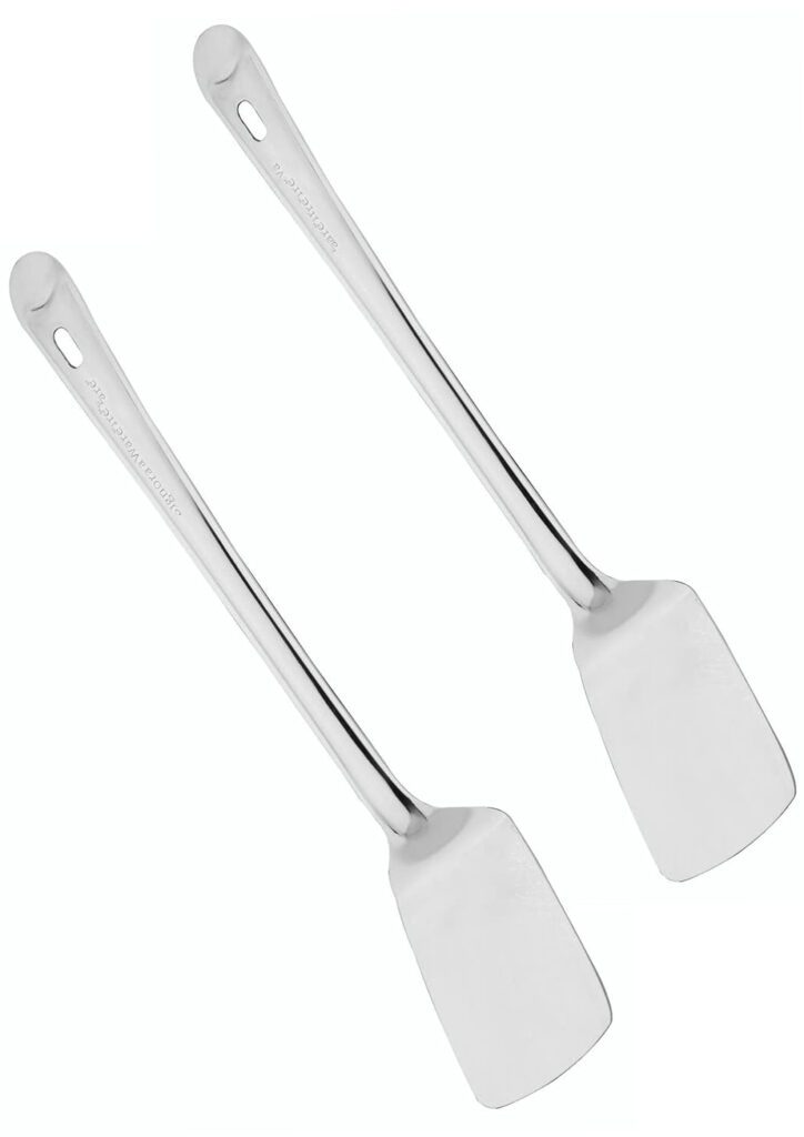 Set of two stainless steel spatulas with polished finish, ideal for flipping, turning, and serving foods