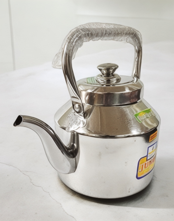 "Dhara Steel Kettle crafted with high-quality stainless steel, perfect for boiling water and beverages