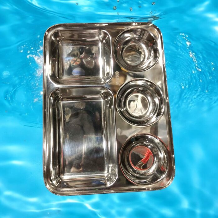 Onam 5-in-1 Bhojan Thal with round design, deep compartments, and heavy-gauge stainless steel for a premium dining experience.