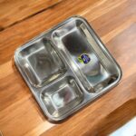 Sunrise Stainless Steel 3-in-1 Bhojan Thals (Set of 2) with a sleek, durable design and three compartments for a perfectly organized dining experience.