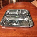 Dolphin 3-in-1 Bhojan Thal Set of Two with three spacious compartments, crafted from premium stainless steel for a durable and versatile dining experience.