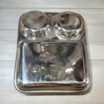 Onam 3-in-1 Bhojan Thal Set of Two with round compartments, crafted from high-quality stainless steel for stylish and durable dining.