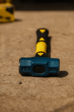 Heavy sledge hammer with forged steel head and indestructible fiberglass handle, designed for construction, demolition, and heavy-duty industrial use.