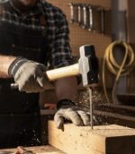 Heavy Duty Sledge Hammer with a forged steel head and sturdy wooden handle, designed for construction, masonry, industrial, and utility work.