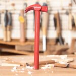 Heavy-Duty Metal Claw Hammer with tubular iron handle – durable curved claw hammer for carpentry, construction, and home repair use.