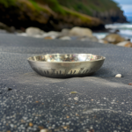 A handcrafted 5-inch WellnessCarve Bronze Cherry Plate, featuring a smooth finish and elegant design, perfect for serving and enhancing traditional dining experiences.