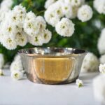A handcrafted 6.5-inch VitalRoots Bronze Pari Bowl with a smooth finish and elegant design, perfect for serving and promoting healthy dining habits.