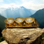Golden Grace Celebration Brass Set of 7 Pc with 3 bowls, 3 spoons, and an embossed 12-inch tray, perfect for weddings and anniversaries