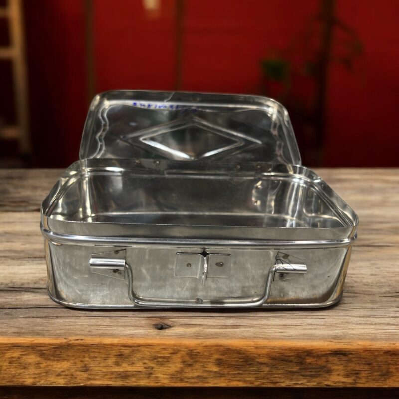 Polished stainless steel jewelry box with a diamond-inspired design, ideal for wedding jewelry storage and bridal gifting.