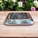 Arush Square Plate made from durable stainless steel, with a modern square design, measuring 8.25 inches in width and height, perfect for family meals.