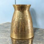 A premium Mayur Regal Sip Brass Tumbler Set (300 ml, Set of Two) with an intricate floral design, crafted for weddings, festive occasions, and luxury gifting.