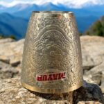 A premium Royal Elegance Brass Tumbler Set (400 ml) with a polished golden finish, handcrafted for luxury gifting and fine dining.