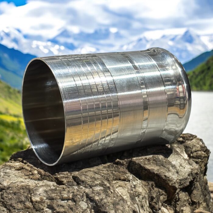 The 301 Hi-Tech Glassi Deep Line Set of 6 (240 ml) offers a durable, eco-friendly, and stylish alternative to plastic and glassware. Made from 100% food-grade stainless steel, these unbreakable glasses are perfect for serving hot or cold beverages while adding a touch of elegance to your drinkware collection.