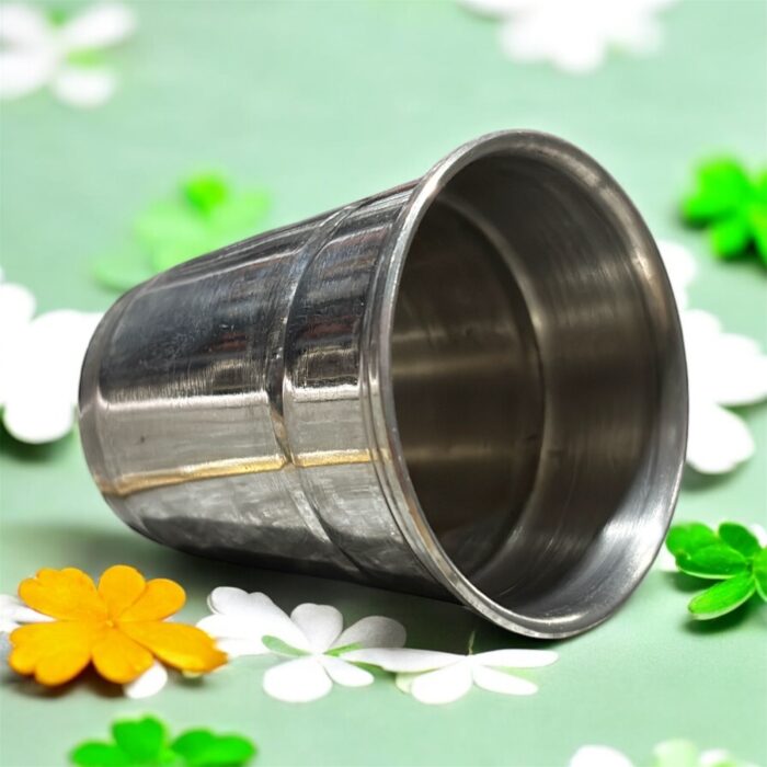 A high-quality stainless steel pooja glass with a 40ml capacity, perfect for offering sacred liquids during worship rituals.