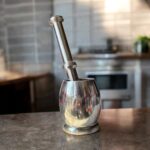 Stainless Steel Natraj Khal Batta (Mortar and Pestle) set in two sizes for grinding spices and herbs.