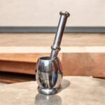 Stainless Steel Natraj Khal Batta (Mortar and Pestle) set in two sizes for grinding spices and herbs.