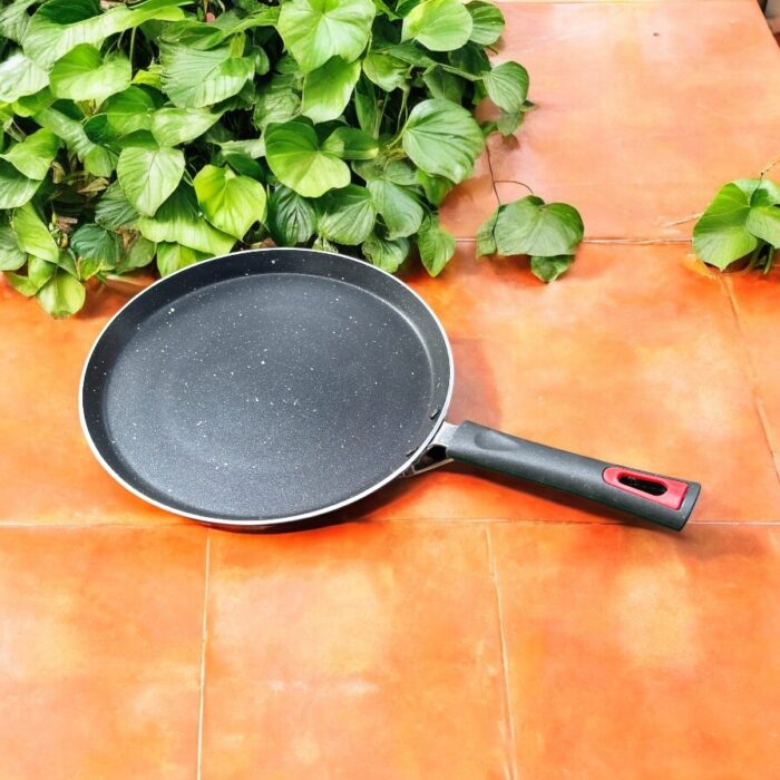 Top view of Pooja 25 cm hard anodized dosa tawa with induction base, featuring a thick 2.8 mm non-stick surface and ergonomic handle.