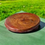 A flat, handcrafted wooden chakla made from sustainable taali (Indian teak/rosewood) wood, ideal for rolling rotis, puris, and parathas with a traditional touch.