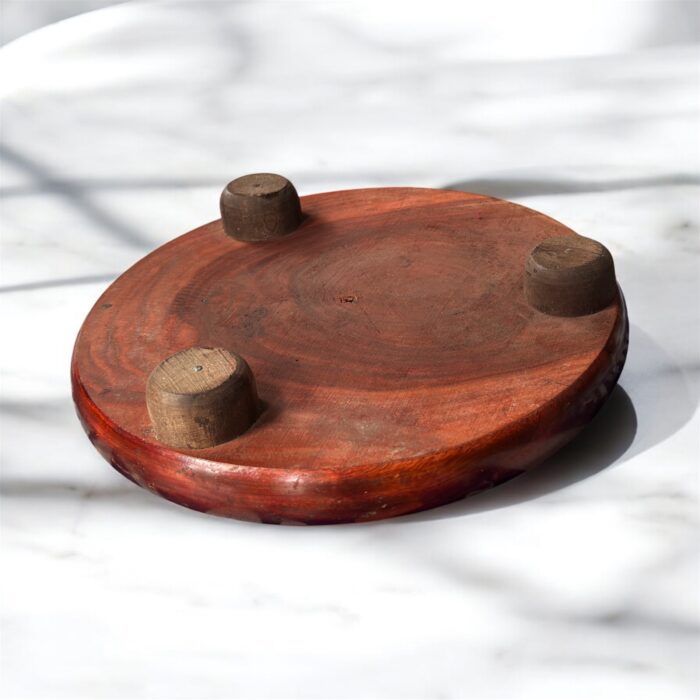 A flat, handcrafted wooden chakla made from sustainable taali (Indian teak/rosewood) wood, ideal for rolling rotis, puris, and parathas with a traditional touch.