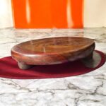 A flat, handcrafted wooden chakla made from sustainable taali (Indian teak/rosewood) wood, ideal for rolling rotis, puris, and parathas with a traditional touch.