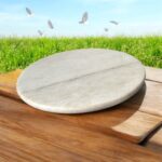 A lightweight white marble roti chakla with a smooth surface, designed for easy handling and effortless rolling of rotis and puris.