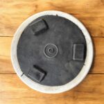 A premium white marble chakla with a non-slip rubber base, designed for stable and smooth rolling of rotis, parathas, and puris.
