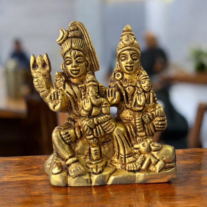 Divine brass Shiva Parivar idol featuring Lord Shiva, Parvati, and Ganesha