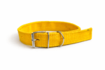 Yellow traditional ghungroo dog collar with four brass bells, designed for Indie and guard dogs, placed on a white background