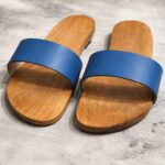 Traditional Devi Charan Paduka set of two placed in a home mandir, symbolizing divine footsteps for daily puja, temple rituals, and spiritual worship.