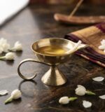 Set of 2 pure brass diya with handle for aarti and pooja rituals, traditional Indian oil lamp for home temple and festive use