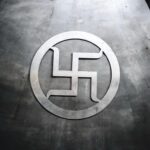 Polished steel Shubh Swastik wall art symbol for Vastu, ideal for home entrance, shop inauguration, Diwali decoration, and Griha Pravesh, available in 8, 10, and 12 inch sizes.