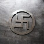 Polished steel Shubh Swastik wall art symbol for Vastu, ideal for home entrance, shop inauguration, Diwali decoration, and Griha Pravesh, available in 8, 10, and 12 inch sizes.