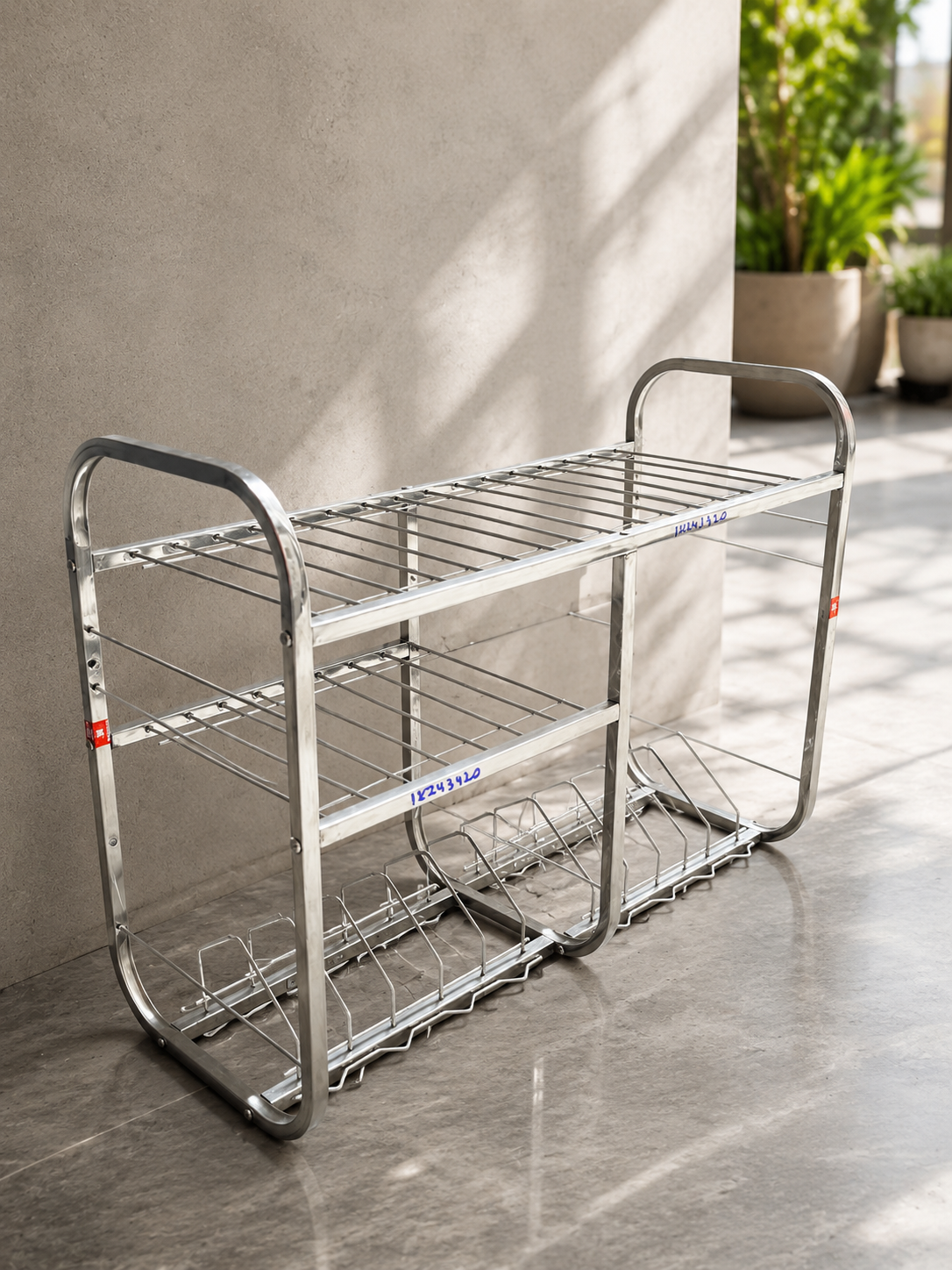 Premium stainless steel 3-tier utensil drying rack for kitchen storage and dish organization with plate holder and multipurpose compartments.