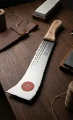 Heavy-duty South Indian darat with a curved sharp steel blade and wooden handle, designed for farming, plantation work, bush clearing, and agricultural cutting tasks.