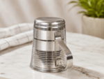 Mayur Gold Classic V-Shape Steel Mug 200ml made from premium food-grade stainless steel with a polished mirror finish and sturdy handle. Ideal for tea, coffee, milk, water, juice, and everyday use at home, office, restaurants, and hotels.