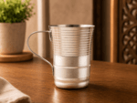 Mayur Gold Classic V-Shape Steel Mug 200ml made from premium food-grade stainless steel with a polished mirror finish and sturdy handle. Ideal for tea, coffee, milk, water, juice, and everyday use at home, office, restaurants, and hotels.